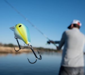 Crankbait lure getting launched into the air